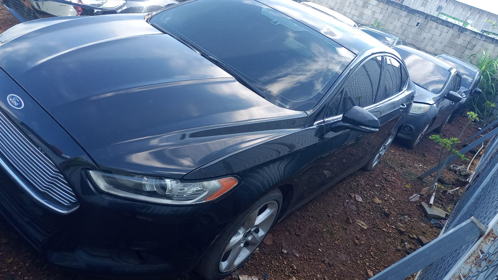 Imagen bienes Ford Fusión Color Negro Año 2014 RD$475,000.00