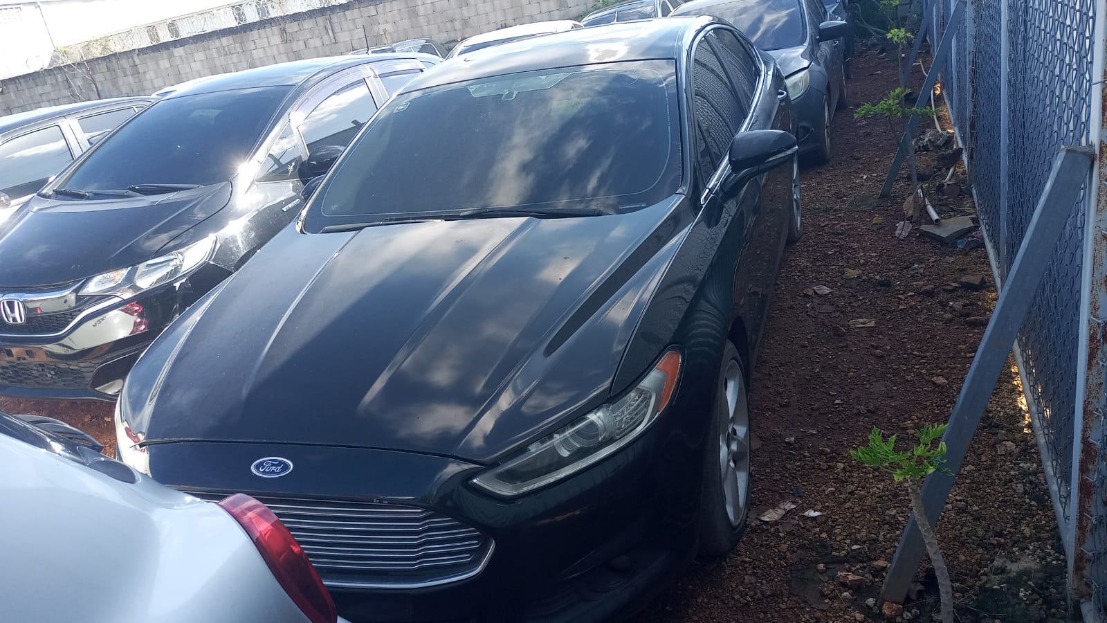 Imagen bienes Ford Fusión Color Negro Año 2014 RD$475,000.00